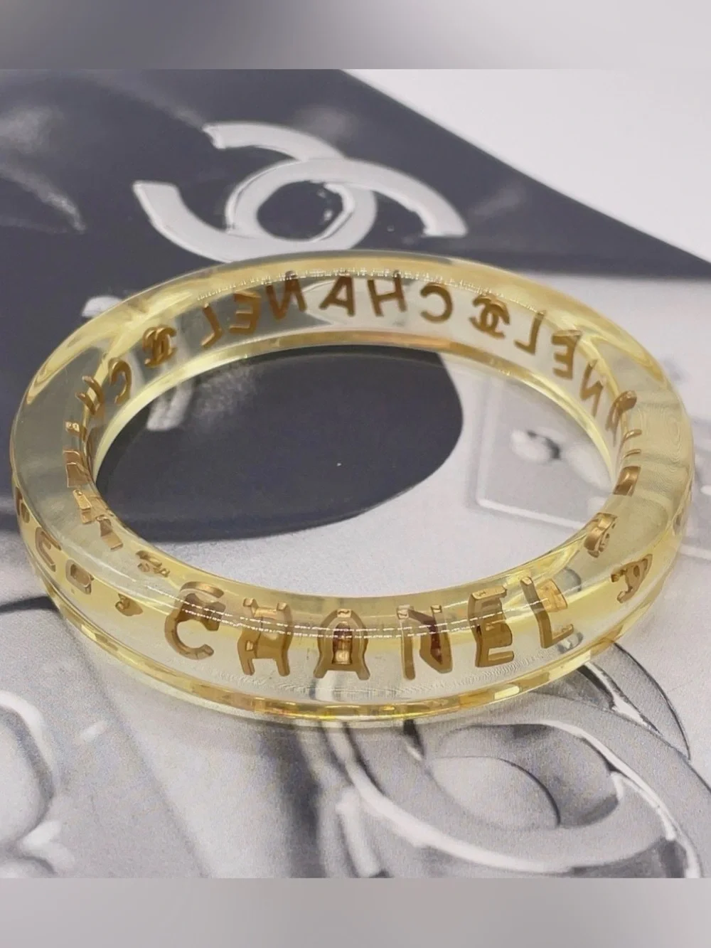 CHANEL LUCITE & Gold Letter Clear Acrylic Bangle - Picture 5 of 12